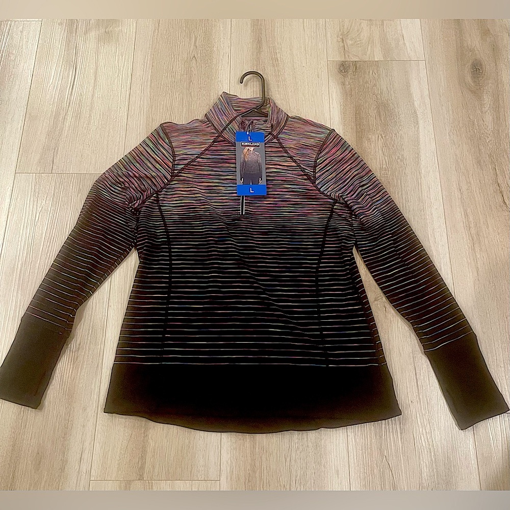 Ladies quarter zip jacket. Size large Kirkland brand. NWT super warm and cozy.